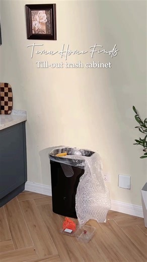 A clean, space-saving cabinet that hides trash neatly while adding extra storage to your kitchen. 🔍 Find it at https://temu.to/m/gckvhbws15m or with this code fdu2556. #temu #kitchenstorage | Temu