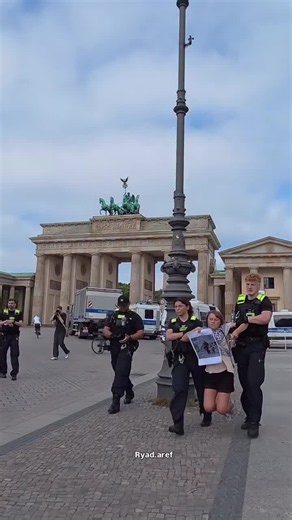 The video captures the moment Swedish activist Greta Thunberg was escorted by police while holding a photo of civilians from Gaza during a protest in Berlin, in footage that sparked widespread… | BOUAZOUZI Faïza-Sihem