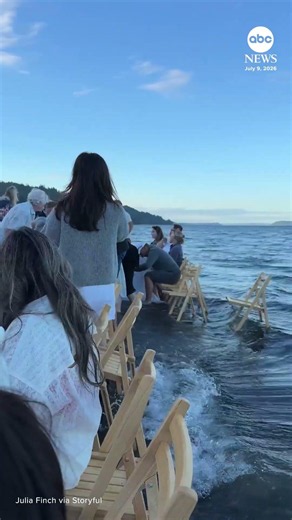 Seaside dinner interrupted by incoming tide