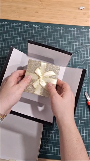 Candy surprise expplision box tutorial video ! I did not know what to get my boyfriend but he has a sweetooth, so I decided to make an explosion box for him, filled with his favourite snacks (that we usually never buy 😂) I first though to make the box but saw these two in a store, so I got them. Cut off at the corners and that's part one! Stay tuned for part 2 🥰 #tutorial #ideecadeau #presentideas #explosionboxes #surprisebox #diypresent #christmascrafts #christmaspresentideas | Elodie Guéguen