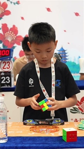 Fastest time to solve a 3x3x3 rotating puzzle cube - Xuanyi Geng