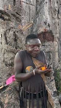 Hadza bushmen Chabba try something new in the bush first time