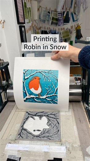 Michelle Hughes Design | Yorkshire Linocut Artist & Printmaker on Instagram: "I thought I’d share how I printed the original linocut print for this year’s Robin Christmas card. It’s created using the multi-block method, where a lino block is carved for each colour in the design. Then each block is inked up and printed with a few days’ drying time between them. I printed a few, just in case I messed up one of the layers. I hope you like them if you’ve received one for Christmas. 🎄 #linocut #prin