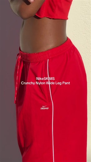 NikeSKIMS Crunchy Nylon in University Red - available October 22. | Wide Leg Pants