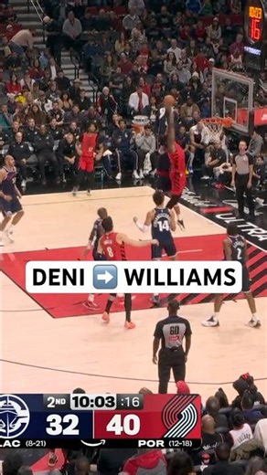 Deni throws the alley oop to Robert Williams for the tough dunk
