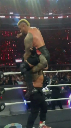 Roman Reigns crashes Solo Sikoa through the table!