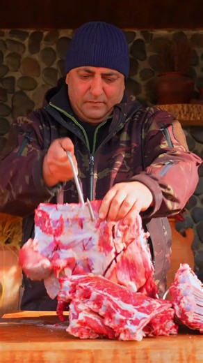 Flame-Grilled Rib Feast: Juicy Meat Cooked Over Open Fire