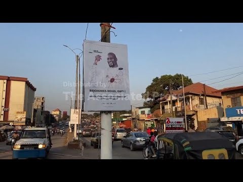 Supporters of Mamadi Doumbouya celebrate their candidate's victory in Guinea's election