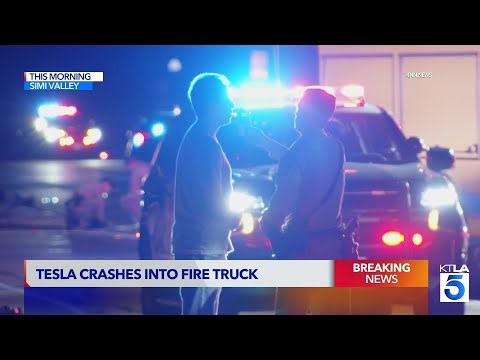 Firefighter hurt after Tesla crashes into fire engine
