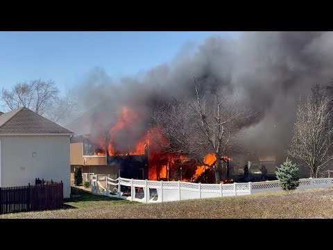 Video shows flames, heavy smoke from Blue Springs house fire on 10th Street