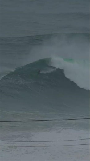 Surfer vs Epic Atlantic Swell in Nazaré, Portugal 🌊 #nazaré #waves