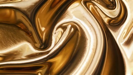 Abstract video of swirling liquid gold texture, close-up angle | Premium Stock Video Footage