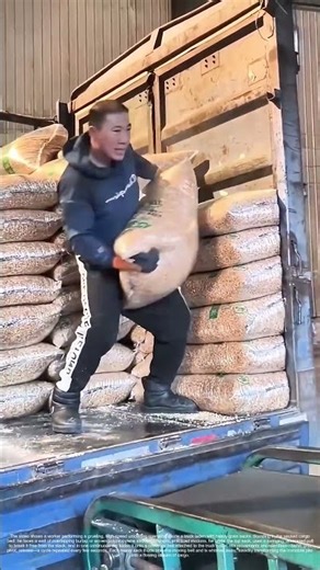 The Sack Sprint: Unloading a Mountain of Grain by Hand and Conveyor