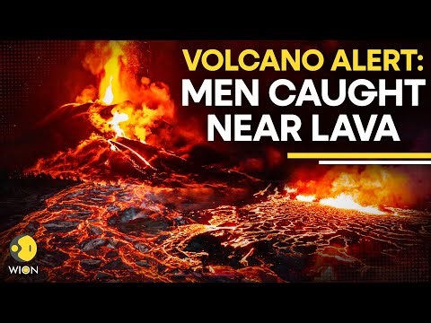 MOMENT: Two Men Walk Next To Erupting Volcano As Lava Shoots Sky-High | WION Originals