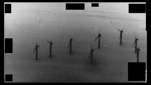 UFO files shows a white orb flying between turbines. Could it be aliens?🤔
