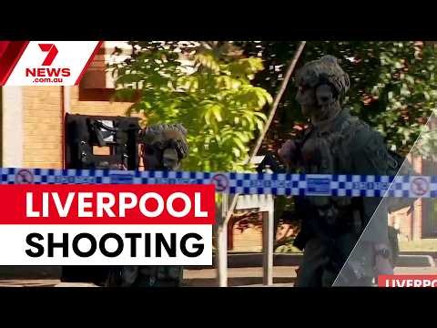 Tactical police search for gunman following Liverpool shooting | 7NEWS