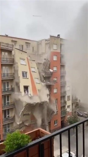 A sudden mid-level explosion blows out an apartment building