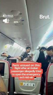 Passenger arrested after allegedly trying to open plane's emergency exit