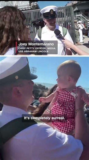 USS Lincoln sailor hugs baby for first time