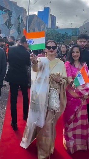 Rekha hoists the Indian flag abroad on 15th August and wishes everyone freedom.