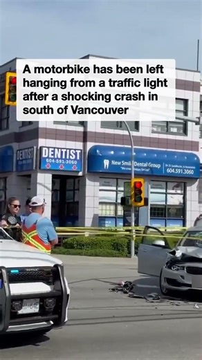 Motorbike left dangling from a traffic light after horrific collision