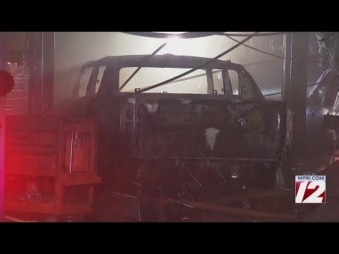 Fire tears through Providence auto repair shop Friday