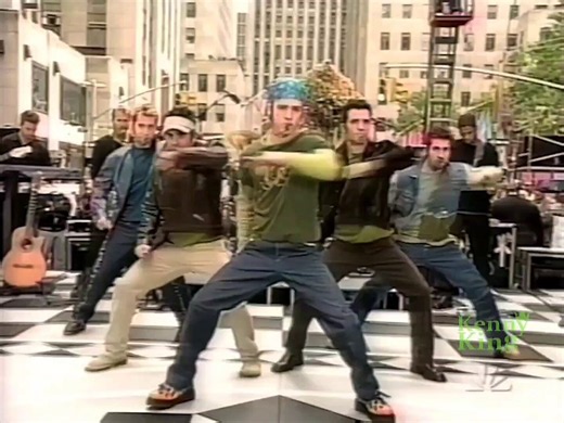 There were six members of NSYNC. Five of them knew it.Lou Pearlman wrote himself into the band's contracts as a sixth member, collecting a full share of the group's already reduced 49% of earnings. Then he collected again as their manager. Then again as their record label. Then again on merchandise. Four separate cuts from the same revenue stream, layered so the teenagers signing couldn't trace where the money went. The guys were making $35 a day while their first album sold 10 million copies."N