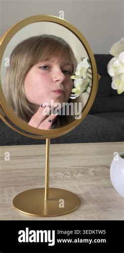 young beautiful woman in front of a mirror in the room Stock Video Footage - Alamy