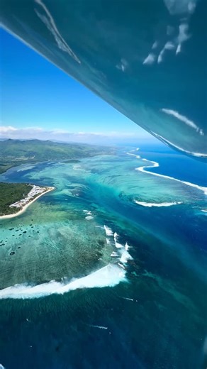 Mauritius Island on Instagram: "One of the highlights of this year, the iconic underwater waterfall at Le Morne Located on the southern part of Le Morne, this underwater waterfall is an illusion created by the changing tides, sand and other underwater canyons at La passe St Jacques giving the stretch of water this unmistakable beauty Best seen with full lights, no clouds and check the tides for maximum effect( high to low) Seaplane fligts with @lagoonflight #mauritiusexplored #mauritiusisland #m