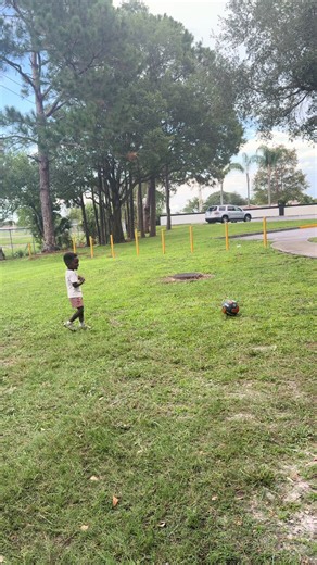 3 year old taking long free kicks already like a pro 🤯 no look crossbar 🥶