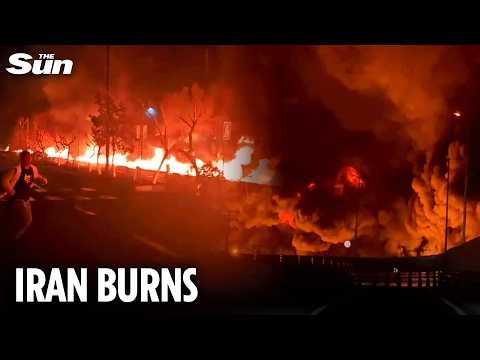 Terrifying moment ‘RIVER OF FIRE’ flows through Tehran after oil depot blitz