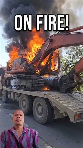 Excavator Engulfed in Flames: Heavy Transport Disaster