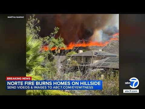 Flames creep dangerously close to Orange County homes during wildfire