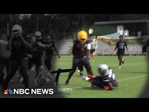 Youth football game brawl leads to mother's arrest for allegedly storming field, kicking player