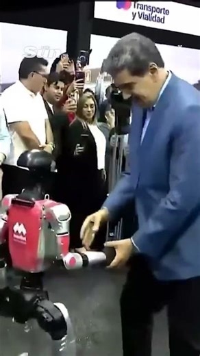 Moment tyrant Maduro salsas with robot as US flies spec ops to Caribbean #usa #venezuela #maduro