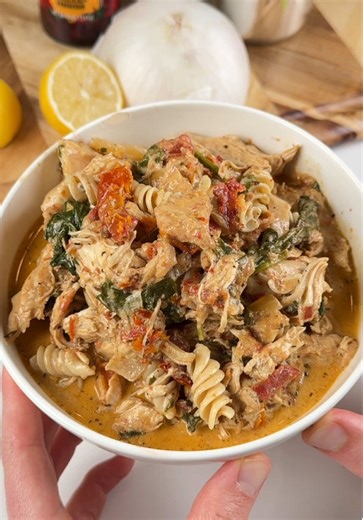 Tuscan Chicken Pasta 🍝🐔🔥 Recipe below ⬇️ Get my high-protein low carb KETO PASTA by going to the link in my bio or searching “Care Free Kitchen Keto Pasta” on Amazon 🙌 What you need: 8 oz low carb pasta, boiled 3 chicken breasts 1 jar of sun dried tomatoes 1 cup chicken broth 1 white onion, chopped 2 cups spinach 1/2 cup Parmesan 1/2 cup cream Seasonings How to make it: 1. In a slow cooker, cook your chicken, sun dried tomatoes, broth, onion & seasonings for 3 hours on high. 2. Shred your ch