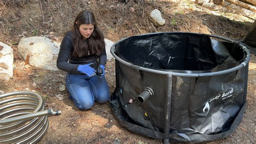 She built a wood-fired hot tub on her 15-acre homestead then winter froze the water and left it unusable