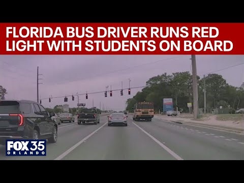 Florida school bus driver runs a red light with students on board