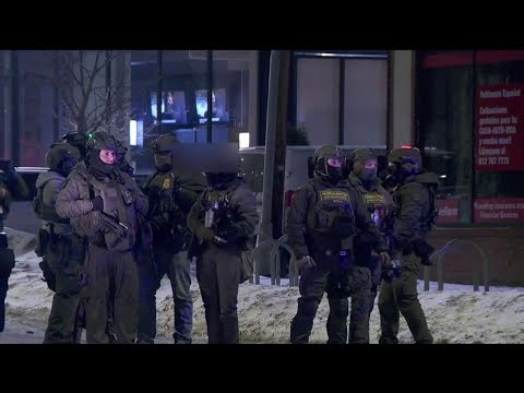 Anti-ICE protesters clash with law enforcement outside hotel in Minneapolis