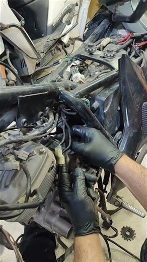 A diagnostic or cable replacement operation is being performed on the power line #motovlog #mechanic