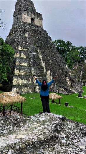 Standing among ancient giants of Tikal. A journey back through time in the heart of the Mayan world.