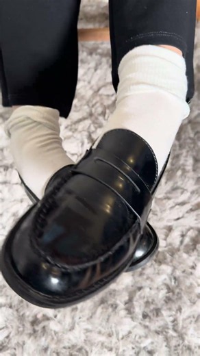 Penny loafers and white socks