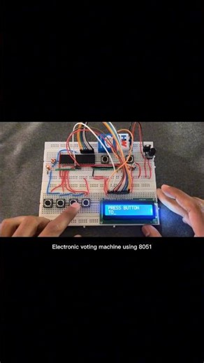 electronic voting machine using 8051