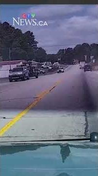 Watch as a U.S. police chase sends a fleeing U-Haul flying