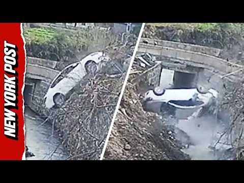 TERRIFYING Moment Car Plunges Backwards into Creek