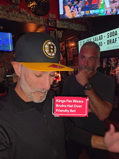 Boston Bruins defeated the LA Kings 4-1. Kings fan honors friendly bet with Bruins fan by wearing Bruins hat #NHL #hockey #Bruins #Kings #friendlybet @NHL @Boston Bruins @LA Kings @The Boston Globe @Barstool Sports @Boston.com @Rocknpies🍕