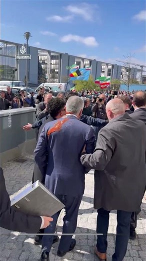 Protester hurls red fluid at Reza Pahlavi during Germany visit | AJ#shorts