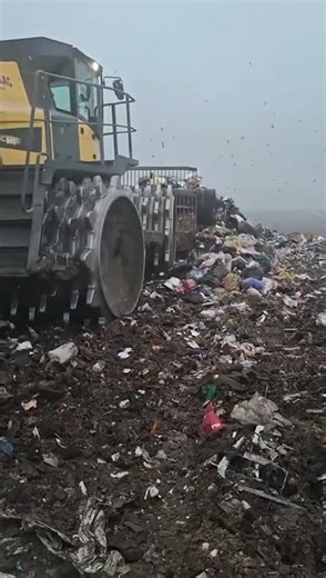 Heavy-Duty Landfill Compactor in Action | Waste Management at Work