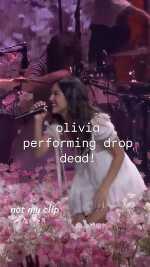 Olivia rodrigo performing drop dead at the unraveled tour