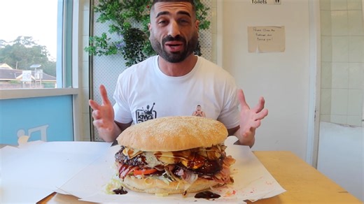 Competitive eater tries to become the first person to beat this burger food challenge